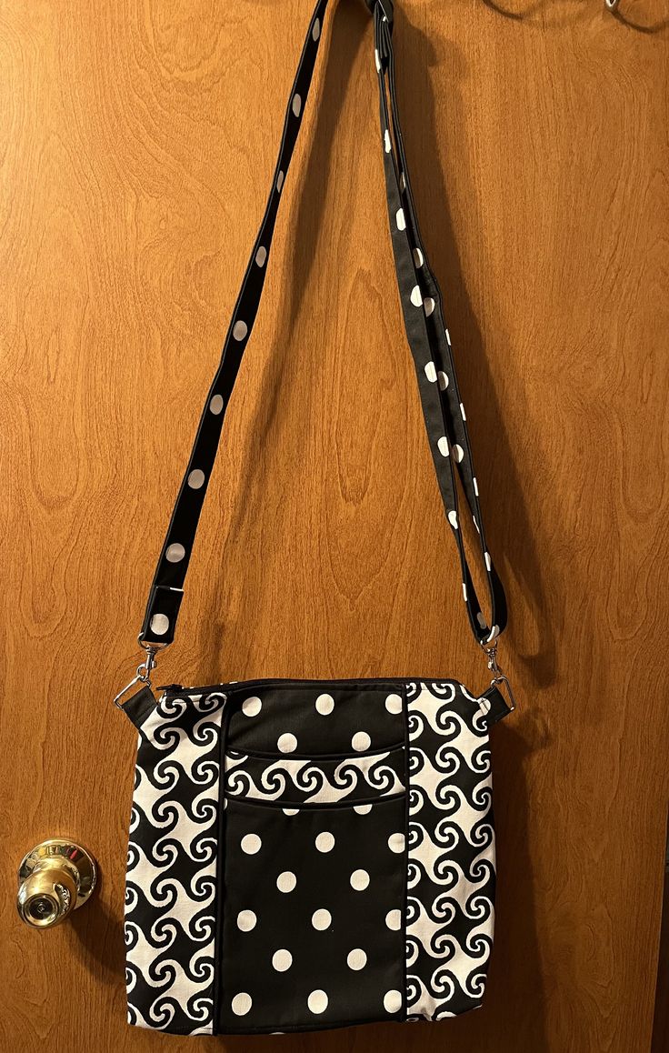 "11\"h x 12w Zip closure 2 front slip pockets 4 inside slip pockets  Adjustable strap Made with duck canvas fabric" Black And White Handbag, Christmas Towels, White Handbag, Duck Canvas, Flour Sack Towels, Purses And Handbags, Canvas Fabric, Shoulder Bags, Adjustable Straps