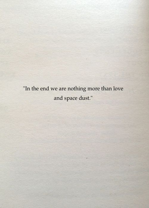 an open book with the words in the end we are nothing more than love and space dust