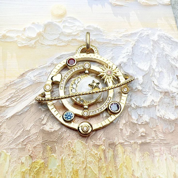 🌙🪐 Add some celestial magic to your jewelry collection with this stunning pendant necklace - Moon Necklace! The intricate design features a half-moon embellished with sparkling zirconia stones, surrounded by stylized orbits and a vibrant sun, heart, and coin. The stunning 3D effect of the planetary ring, with its lofted dots, adds an extra touch of cosmic beauty. On the back, inspiring words are engraved: "FOLLOW YOUR HEART, FEEL YOUR ENERGY, BELIEVE IN YOUR LUCK, LIVE YOUR DREAMS". Made of high-quality 925 sterling silver, this pendant is a must-have for any cosmic enthusiast. ✨❤️ Item Weight: 8.73g Pendant Size: 4.2x4.8cm Spiritual Gold-plated Clavicle Charm Necklace, Luxury Spiritual Pendant Medallion Necklace, Luxury Spiritual Locket Necklace, Planetary Rings, Luxury Zodiac Sign Amulet, Yellow Gold Zodiac Sign Amulet Necklace, Sacred Geometry Jewelry, Cosmic Jewelry, Celestial Magic