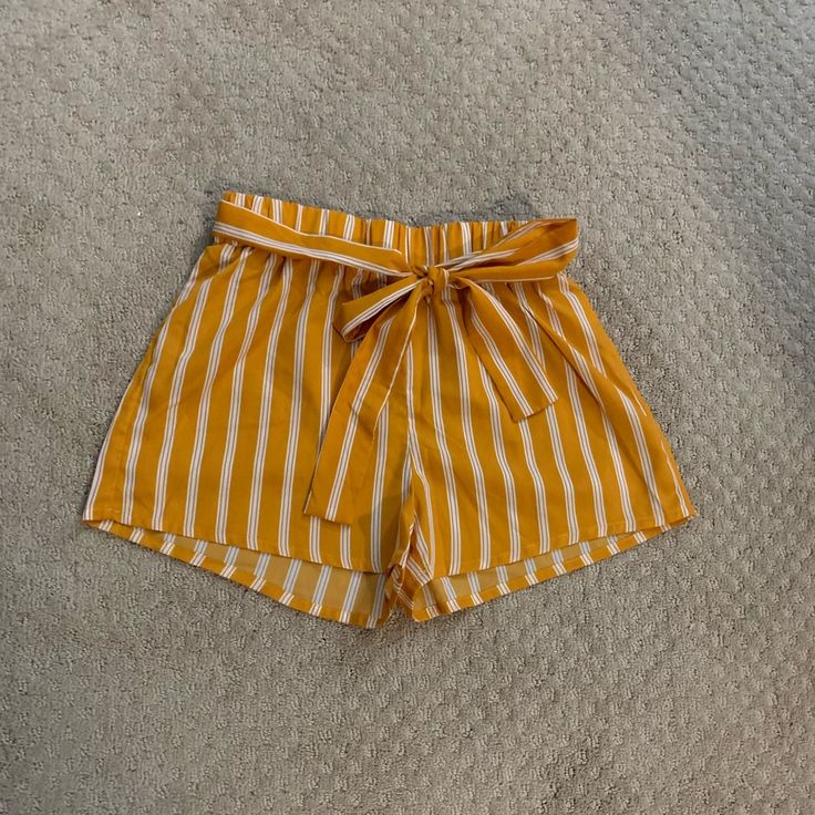 Brand New Never Worn But No Tags. The Strap Can Be Removed As Needed. Fits At Around The Belly Button Trendy Yellow Shorts For Beach Season, High-waisted Yellow Shorts For Beach, High Waist Yellow Shorts For Beach, Chic Yellow Shorts For Vacation, Chic Yellow Shorts, Trendy Yellow Shorts For Spring, Yellow Shorts For Beach Day Out, Yellow Shorts For Beach Season Day Out, Chic Yellow Shorts For Day Out