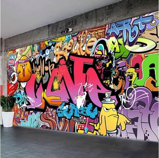 the wall is covered with colorful graffiti