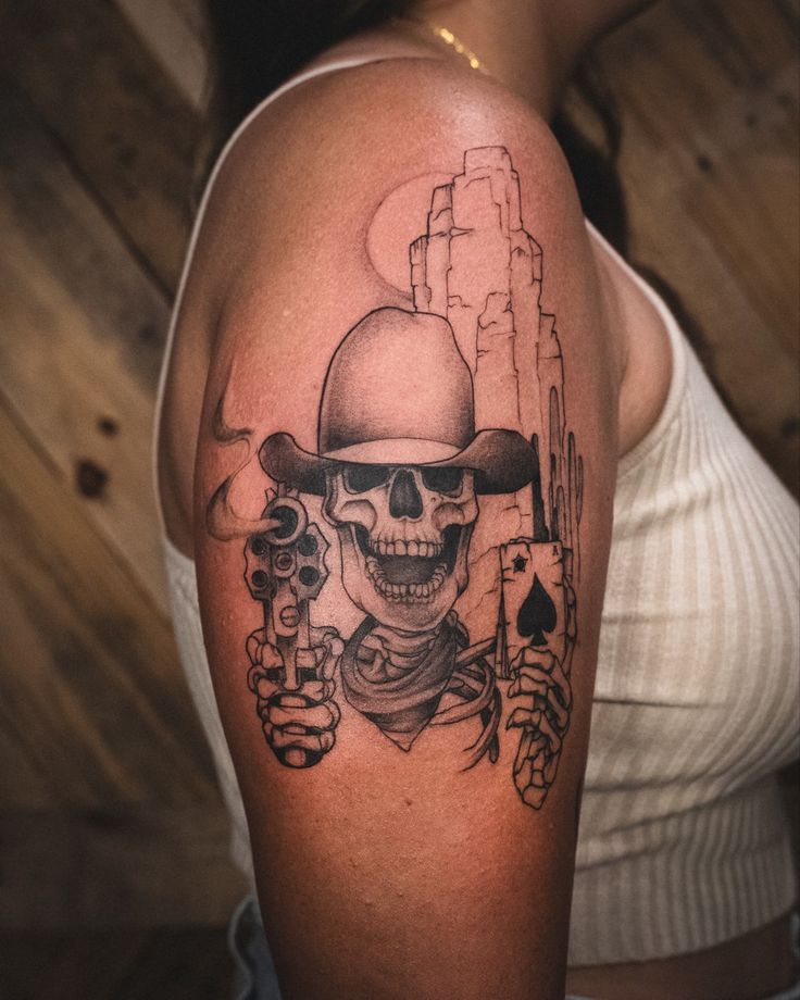 Women’s Skeleton Tattoo, Cowboy Tattoos Sleeve, Western Skull Hand Tattoo, Southern Sleeve Tattoo, Cowboy Scene Tattoo, Medium Size Western Tattoos, Western Upper Arm Tattoos, Skeleton Cowboy Hat Tattoo, Full Sleeve Tattoos Women Country