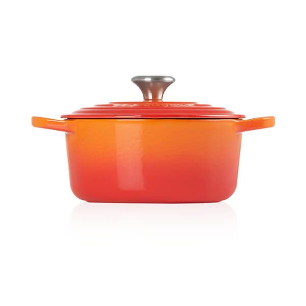 an orange casserole dish with a lid