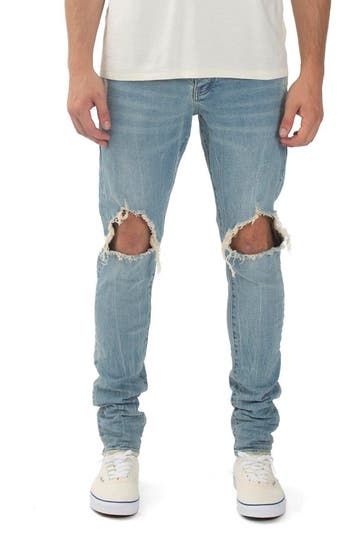 Ripped knees and raw hems lend laid-back style to these skinny jeans enhanced with a bit of stretch to move with you. 98% cotton, 2% Lycra® spandex Machine wash, line dry Imported Asian Founded Distressed Stretch Pants For Streetwear, Urban Fitted Jeans With Frayed Hem, Urban Fitted Distressed Bottoms, Ripped Stretch Jeans For Streetwear, Stretch Ripped Jeans For Streetwear, Streetwear Fitted Jeans With Frayed Hem, Fitted Jeans With Frayed Hem For Streetwear, Medium Wash Slim Fit Bottoms For Streetwear, Urban Style Distressed Stretch Bottoms