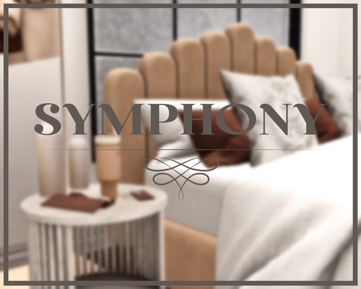 a bedroom with a bed, chair and table in front of the window that says sympathy