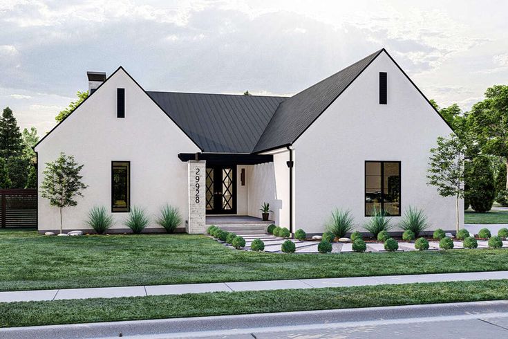 a white house with black roof and windows