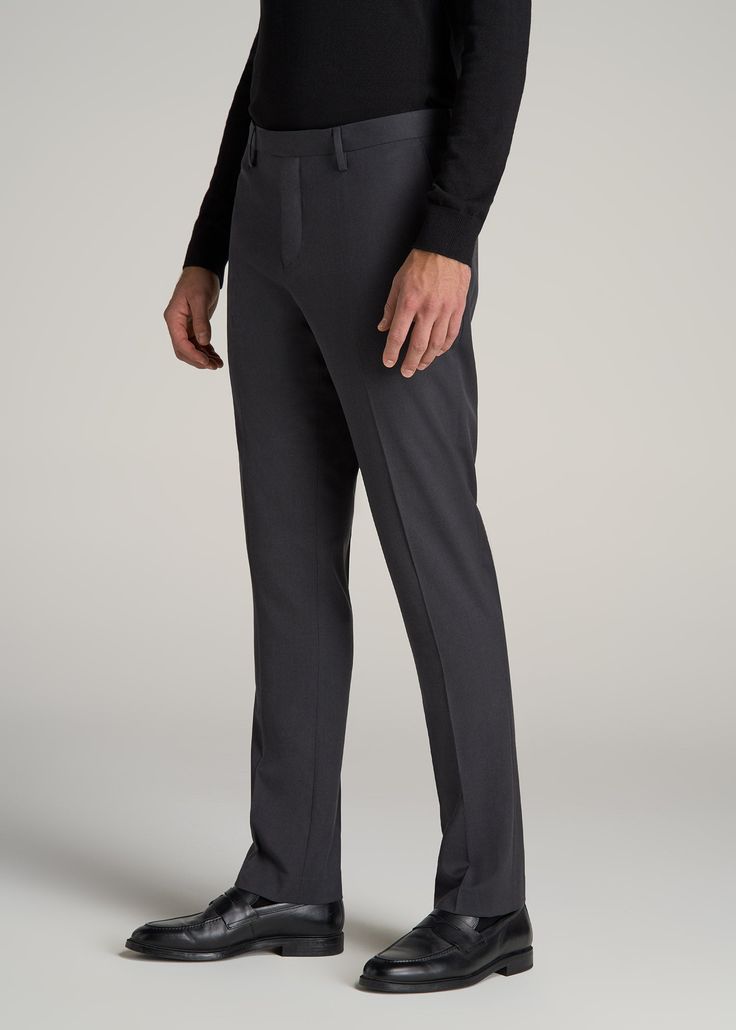 About Our Suit Trousers for Tall Men Crisp, classic and comfortable. That’s what you’ll find in these suit trousers for tall men. Thoughtfully designed for men from 6’ to 7’1, these pants have an extended inseam for longer legs without the extra bagginess you usually find in a longer pant. They’re made with a slightly stretchy polyester blend and feature a comfortable cotton-blend lining. These men’s tall pants feature a tailored fit for a modern look that’s easy to wear from the office to the e Elastane Dress Pants For Business Casual, Classic Elastane Dress Pants, Tailored Business Chinos, Modern Full-length Dress Pants For Business, Formal Slim Fit Full Length Chinos, Slim Fit Formal Full Length Chinos, Tailored Chinos For Formal Occasions, Slim Fit Full Length Chinos For Formal Occasions, Formal Full Length Slim Fit Chinos