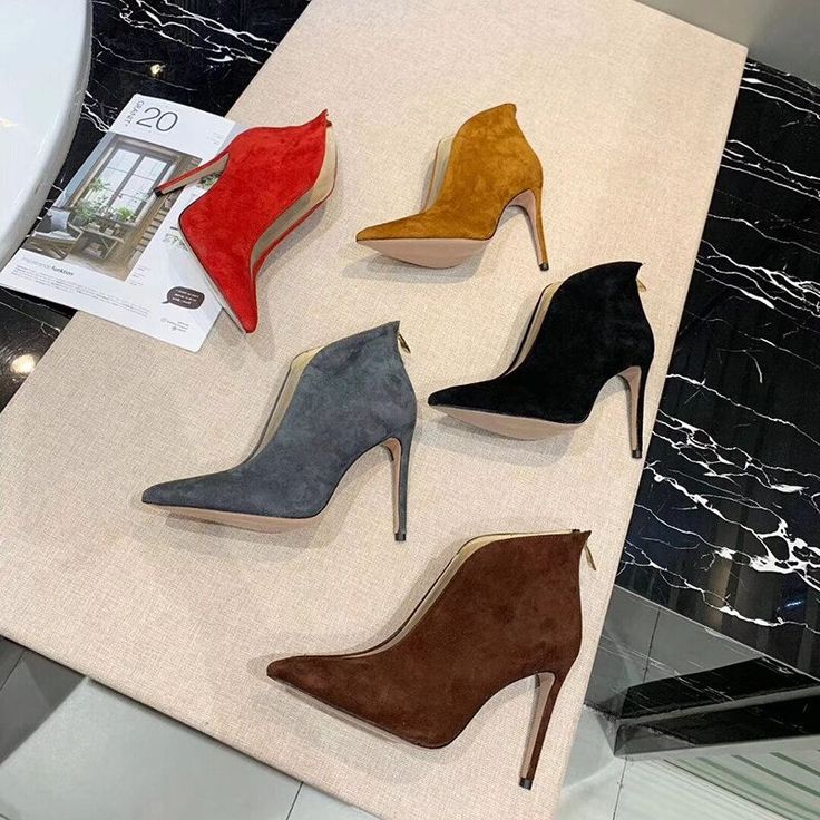 Rock vibes for these suede booties. Zip-up fastening on the back. fully lined iron stiletto. Nappa footbed. Genuine leather sole. Heel: 100 mm.[custom tab]UPPER #1: 100% SUEDE LEATHER | LINING #1: 100% SHEEP LEATHER | OUTSOLE #1: 100% COW LEATHER[/custom tab] Chic Suede Heeled Boots, Trendy High Ankle Suede Heels, Suede High Ankle Heels For Evening, Suede High Ankle Heeled Boots For Party, Chic Suede Heeled Boots With 4-inch Heel, Chic 4-inch Heel Suede Boots, Chic 4-inch Heeled Suede Boots, Suede High Ankle Heels For Party, High Ankle Suede Heels For Party