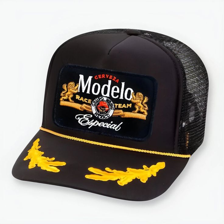 Classic trucker hat featuring a Modelo Especial Race Team patch Adjustable snap back One size fits most Curved, moldable bill Black Trucker Hat With Logo Patch, Black Trucker Hat With Curved Bill, Black Trucker Snapback Hat, Black Trucker Hat With Flat Brim, Black Flat Brim Trucker Hat, Black Trucker Hat With Curved Brim, Black Snapback Trucker Hat, Black Trucker Baseball Cap, Company Gifts