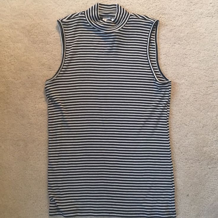 Gap Sleeveless Mock Neck Tank Stretch Jersey Fabric Black And White Stripes New With Tags Size M Striped Sleeveless Stretch Top, Stretch Sleeveless Striped Top, Sleeveless Striped Stretch Tops, Casual Sleeveless Tops By Gap, Casual Sleeveless Gap Tops, Gap Sleeveless Tank Top For Summer, Sleeveless Gap Tank Top For Summer, Fitted Striped Sleeveless Tank Top, White Casual Tank Top By Gap