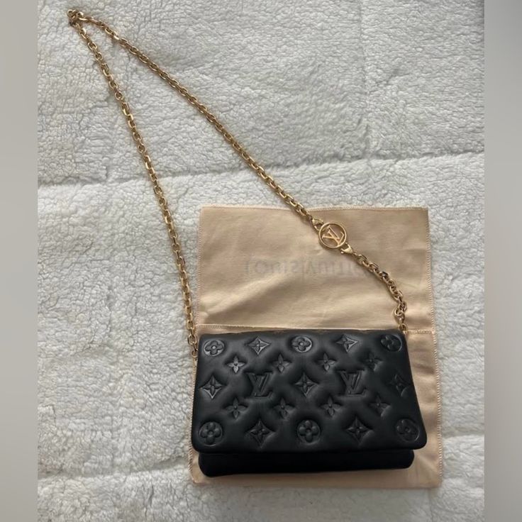 Authentic!! New! Price Firm! Beautiful Black Monogram Pochette Coussin Gold Chain With Lv Emblem Crossbody And Belt Bag Wearing Option Dust Bag Included Never Worn Or Used 7.9wx5.5hx3.1d" I’m A Verified Reseller With Poshmark, So Items Ship Directly To Buyer. Luxury Black Wallet On Chain With Detachable Strap, Luxury Black Wallet On Chain Shoulder Bag, Luxury Black Wallet On Chain With Removable Pouch, Designer Black Wallet On Chain With Dust Bag, Designer Black Wallet On Chain With Removable Pouch, Designer Black Wallet On Chain With Detachable Strap, Pochette Louis Vuitton, Louis Vuitton Pochette, New Price