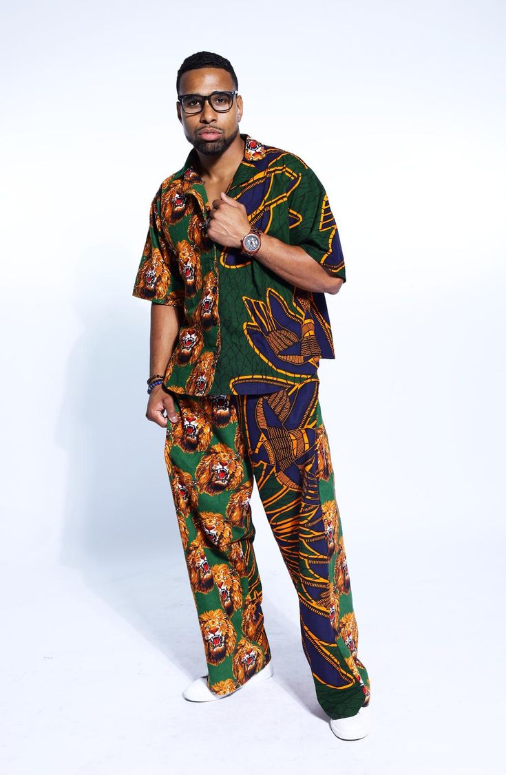 PRODUCT DETAILS: Designed in the U.S., hand-crafted in Africa Delivery within 2 weeks Multiple prints available This exceptional, Igbo Traditional multi-colored shirt and pants set, made of unique cotton African Isi Agu print fabrics, will make you stand out with the pops of color and provide a nice, laid back sense of style! This unisex shirt & pant can be worn as evening wear to various events such as weddings, dinner parties and other formal occasions. FABRIC CARE: Dry Clean. Hand Wash. Machine Wash. SIZE CHART: Casual Patterned Cotton Sets, Multicolor Printed Cotton Pants, Casual Cotton Matching Pant Set, Green Printed Cotton Pants, Multicolor Cotton Pants With Graphic Print, Multicolor Graphic Print Cotton Pants, Cotton Sets With Graphic Print And Relaxed Fit, Cotton Sets With Relaxed Fit Long Pants, Casual Printed Cotton Sets