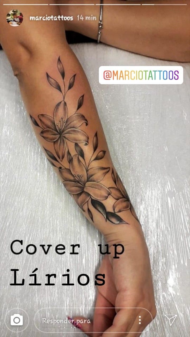 a woman's arm with flowers on it and the words cover up lirios