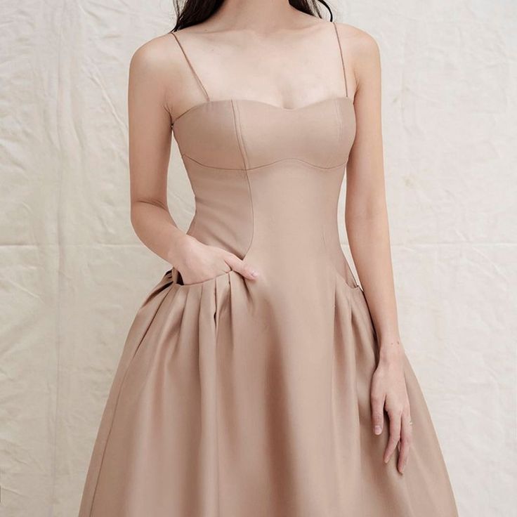 Beige Spaghetti Strap Corset Midi Dress Elegant Beige Spaghetti Strap Dress, Elegant A-line Suspender Dress, Elegant Midi-length Suspender Dress For Prom, Elegant Midi Length Suspender Dress For Prom, Beige Spaghetti Strap Dress For Formal Occasions, Elegant Beige Suspender Dress For Party, Elegant Solid Mini Dress With Built-in Bra, Elegant Midi Suspender Dress With Straps, Elegant Midi-length Suspender Dress With Straps