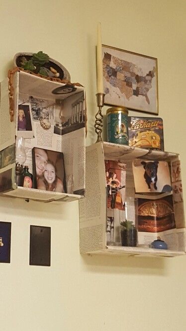 the wall is decorated with pictures and other things