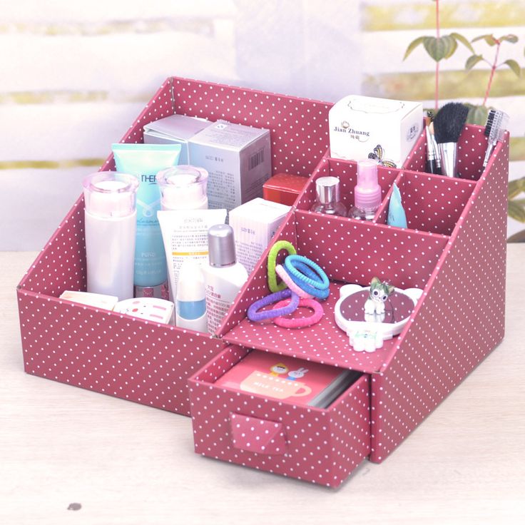 a pink and white polka dot desk organizer