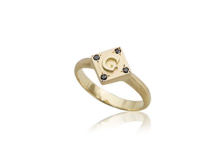 "This is a geometric personalized signet ring. It is made of 14k//18k gold (per your choice), a gold letter of your choice and four beautiful black diamonds! The black diamonds set on the sides of the ring, in a beautiful star inlay, to add to its luxurious, unique style. Get this elegant gold rhombus signet ring for your loved one, or yourself, to upgrade every outfit you own with a meaningful, timeless, bold, and impressive piece of jewelry. ✿ Item details ✿ ✿ Materials: - 14k/18k Yellow//Rose Luxury Custom Signet Ring As Gift, Luxury Personalized Elegant Diamond Ring, Timeless Luxury Signet Ring With Gemstone, Luxury Elegant Rings With Initials, Luxury Elegant White Gold Signet Ring, Elegant Personalized Luxury Diamond Ring, Luxury Initial Ring As Gift, Luxury Elegant Initial Ring As Gift, Luxury Diamond Signet Ring In Elegant Style