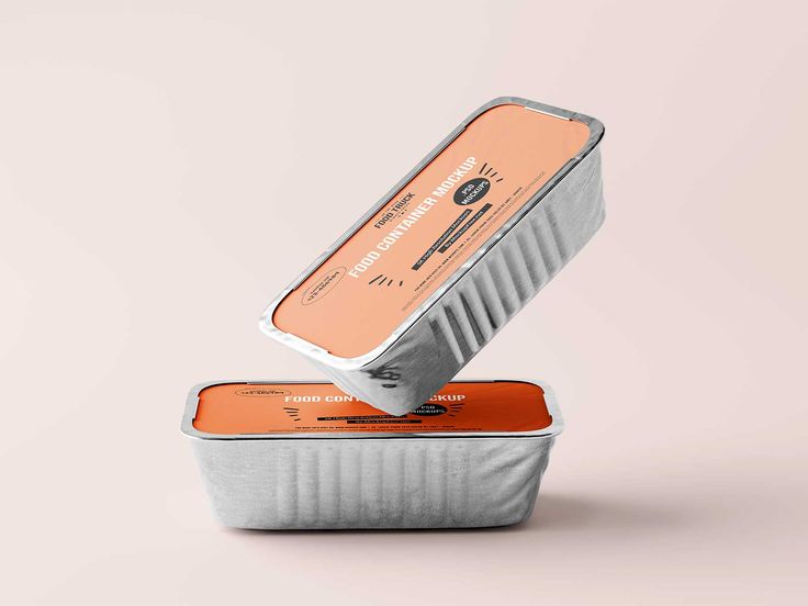 an orange and white container with two tins on the top that are stacked up