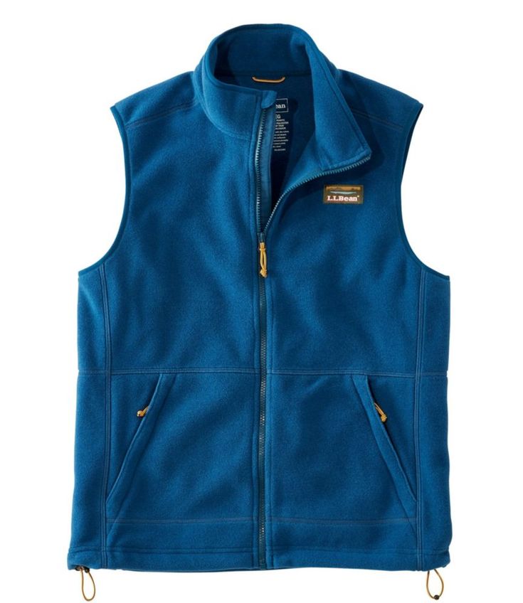 Our best-value fleece vest is designed with inspiration from our archives and made from 100% recycled polyester for unbeatable comfort and wear-anywhere style. Slightly Fitted. Best with lightweight layer. Falls at hip. 100% recycled polyester fleece. Machine wash and dry. Features our classic Mount Katahdin logo. Bean Boot lace-inspired zippers and drawcord. Two lower zippered hand pockets. Elastic arm holes and drawcord hem seal out cold air. Imported. Outdoor Fleece Vest, Outdoor Sleeveless Fleece Vest, Sleeveless Fleece Vest For Outdoor, Casual Midweight Sleeveless Vest, Casual Sleeveless Midweight Vest, Mount Katahdin, Men's Vests, Mens Vests, Bean Boots