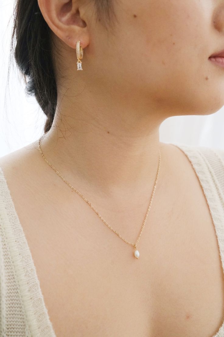 14k gold-filled dainty freshwater pearl necklace - Etsy #pearlnecklace #daintyjewelry #daintynecklace #daintypearlnecklace #necklace #necklaceoftheday #necklaceshop #necklaceoutfit #goldjewellery #goldjewelry #dainty #elegantnecklace #pearl #pearljewellery #pearljewelry #jewelryaddict #jewelrylover #jewelryforwomen #etsyshop #etsyjewelry #handmadejewelry #handmadenecklace #freshwaterpearlnecklace #aestheticnecklace #simplenecklace #goldfillednecklace #necklaceforwomen #necklaceforgirls #giftforh White Teardrop 14k Gold Necklaces, Everyday Drop Pearl Chain Jewelry, Delicate 14k Gold Charm Necklace For Wedding, Delicate Pear-shaped Sterling Silver Jewelry, Teardrop Pearl Chain Jewelry Gift, Dainty Pearl Drop Jewelry For Anniversary, Dainty Drop Necklace For Anniversary, Delicate Briolette Pearl Pendant Jewelry, Classic Yellow Gold Bridal Necklace Gift