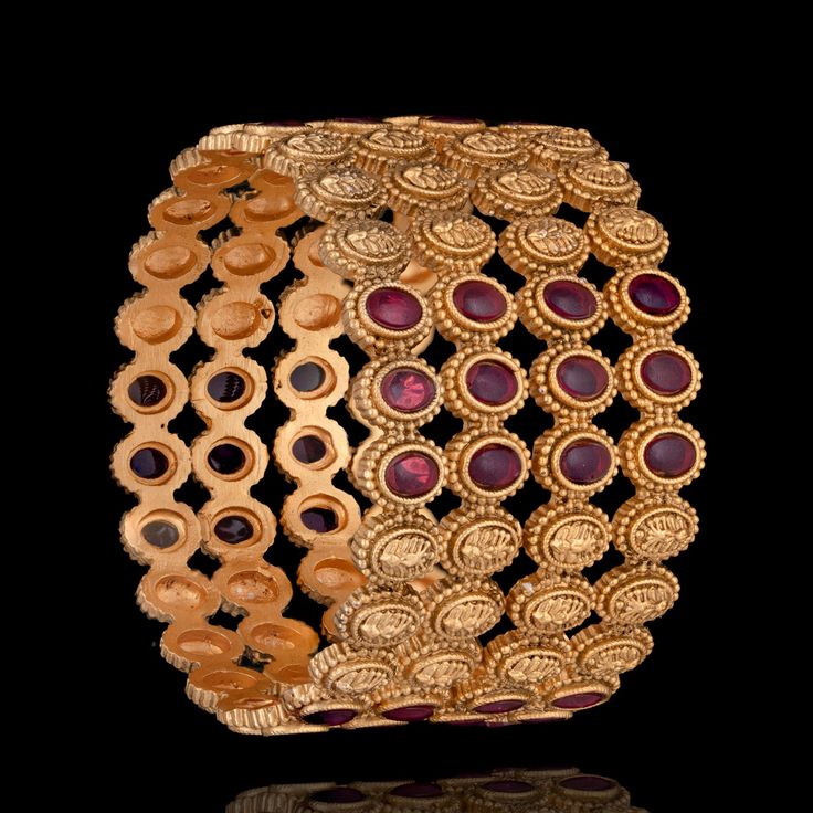 Elevate your festive look and be the center of attention with our Amiliah Bangles because every moment is worth celebrating! Adorn your wrists with the brilliance of ruby stones and the richness of gold metal embossing and let your inner radiance shine. The set includes four bangles that are not openable. Please click on the video for a detailed view of the product. Pair Amiliah Bangles with Bhakti Earrings for a quirky look. Gold-plated on high-quality brass as base metal. In-stock & ready-to-s Regal Gold Jewelry For Ceremonies, Elegant Jeweled Bangle For Festive Occasions, Gold Bracelets For Festive Party Occasions, Gold Bracelets For Festive Party, Elegant Openable Bangle For Festive Occasions, Elegant Openable Bangle For Celebration, Festive Filigree Bangle, Elegant Festive Openable Bangle, Festive Elegant Openable Bangle