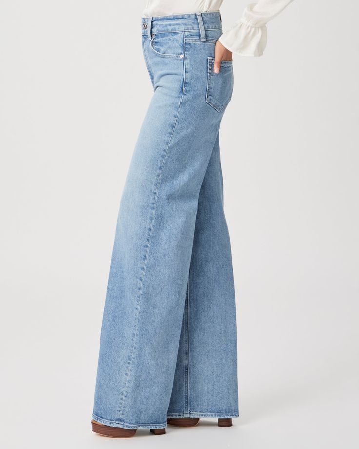 Sasha is our new high-rise wide leg with a loose, relaxed column fit. This pair is cut from our PAIGE VINTAGE denim in light wash with natural fading and subtle lived-in details. PAIGE VINTAGE takes all of the work out of breaking in your favorite pair of vintage jeans. We've combined the comfort of stretch with everything you love about authentic vintage denim to create super soft jeans that feel perfectly lived-in from the very first wear. Medium Wash Wide Leg Pants, Fall Medium Wash High Rise Wide Leg Pants, Fall High Rise Medium Wash Wide Leg Pants, Chic Faded Wide Leg Bottoms, Chic Wide Leg Faded Bottoms, Chic Washed Blue Wide Leg Flare Jeans, Spring Light Wash Wide Leg Jeans, Spring Wide Leg Washed Blue Jeans, Light Wash Wide Leg Pants For Spring