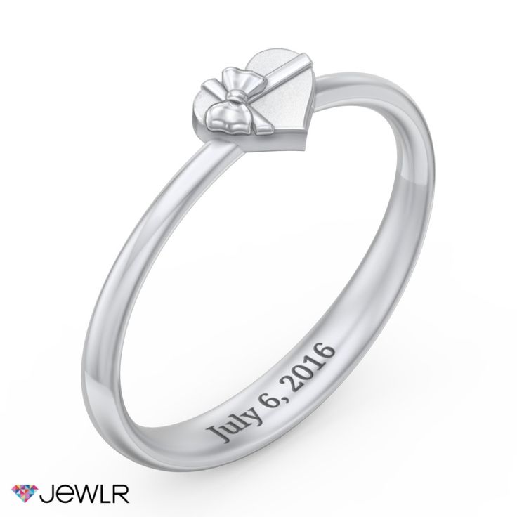 Give the gift of love with this matte finished heart ring featuring a contrasting polished bow. Personalize with engraved names, a date, or sentimental message. Customize in your choice of sterling silver or white, yellow, and rose gold. White Engraved Initial Ring For Anniversary, Classic Personalized Heart Promise Ring, Classic Personalized Heart Ring For Promise, Personalized Classic Heart Promise Ring, White Gold Engraved Initial Ring For Promise, Valentine's Day Promise Ring In Sterling Silver, Classic Engraved Heart Ring For Promise, Personalized White Gold Heart Ring In Sterling Silver, Personalized White Engraved Promise Ring