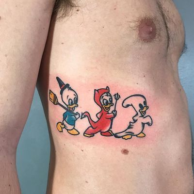 a man with a tattoo on his chest holding a baseball bat and two other cartoon characters