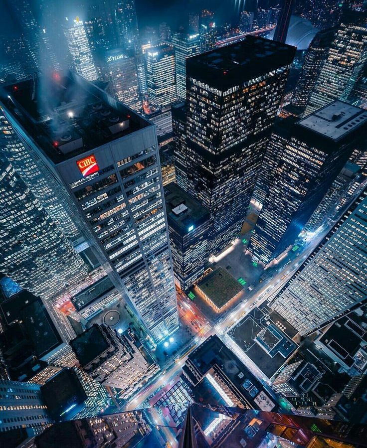 an aerial view of skyscrapers at night in new york city, usa photo taken from above