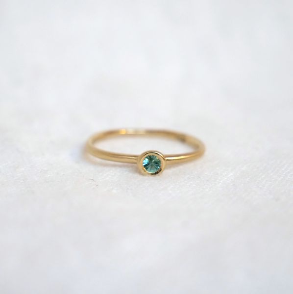 Sacred Bezel Montana Sapphire Gift Stackable Rings In Recycled Gold, 14k Gold Birthstone Ring With Smooth Bezel, 14k Gold Birthstone Ring With Smooth Bezel For Promise, Fine Jewelry Stackable Birthstone Rings With Round Cut, Everyday Green Stackable Rings With Bezel Setting, Fine Jewelry Birthstone Ring With Bezel Setting, 14k Gold Birthstone Ring With Smooth Bezel For Anniversary, Green Minimalist Stackable Rings With Bezel Setting, Recycled Gold Jewelry With Bezel Setting And Round Cut