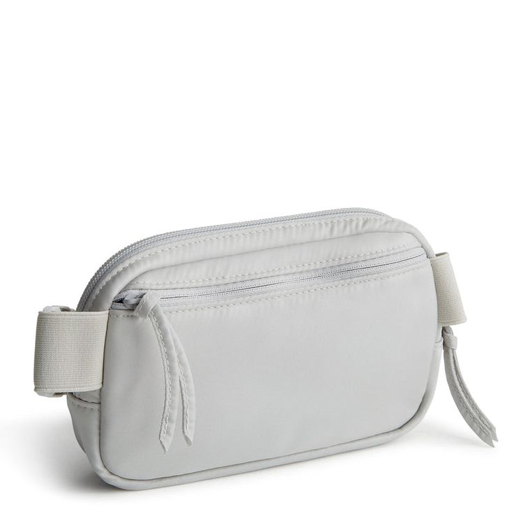 The Woodward Small Belt Bag is the perfect blend of style and functionality for those who prefer a hands-free approach to carrying their essentials. Compact yet versatile, this sleek accessory offers convenient storage for your must-have items while adding a fashionable touch to any outfit. Whether you're out for a walk, exploring a new city or dancing the night away, our belt bag keeps your essentials close at hand and your style on point. Vera Bradley Woodward Small Belt Bag in Gray Versatile Nylon Travel Accessories With Functional Pockets, Functional Pouch Belt Bag For On-the-go, Functional Belt Bag Pouch For On-the-go, Versatile Nylon Belt Bag, Nylon Belt Bag With Adjustable Strap For Everyday Use, Practical Nylon Belt Bag For Travel, Multifunctional Nylon Travel Accessories With Removable Pouch, Multifunctional Everyday Nylon Travel Accessories, Nylon Pouch Belt Bag For On-the-go