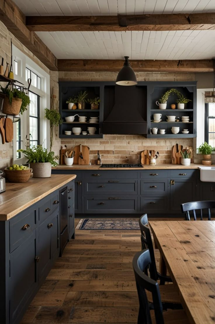 a kitchen with wooden floors and black cabinets, wood flooring, and open shelving