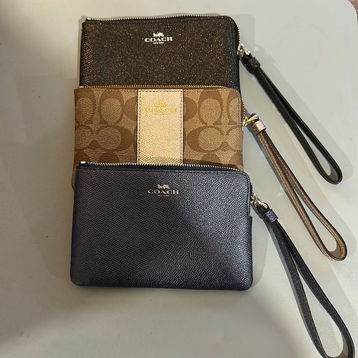 Three Coach Wristlets (Shimmery Blue, Shimmery Black, Brown/Tan). Each Wristlet Has A Two Card Holder Place. Each Wristlet 6” X 4.25” Coach Wristlet, Wristlets, Coach Bags, Blue Brown, Clutches, Card Holder, Color Blue, Bag Lady, Women Shopping