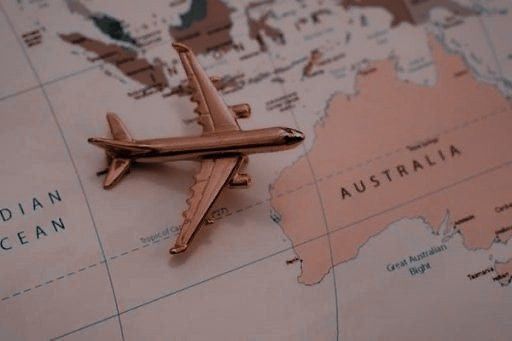 an airplane is sitting on top of a map with the words australian ocean written below it