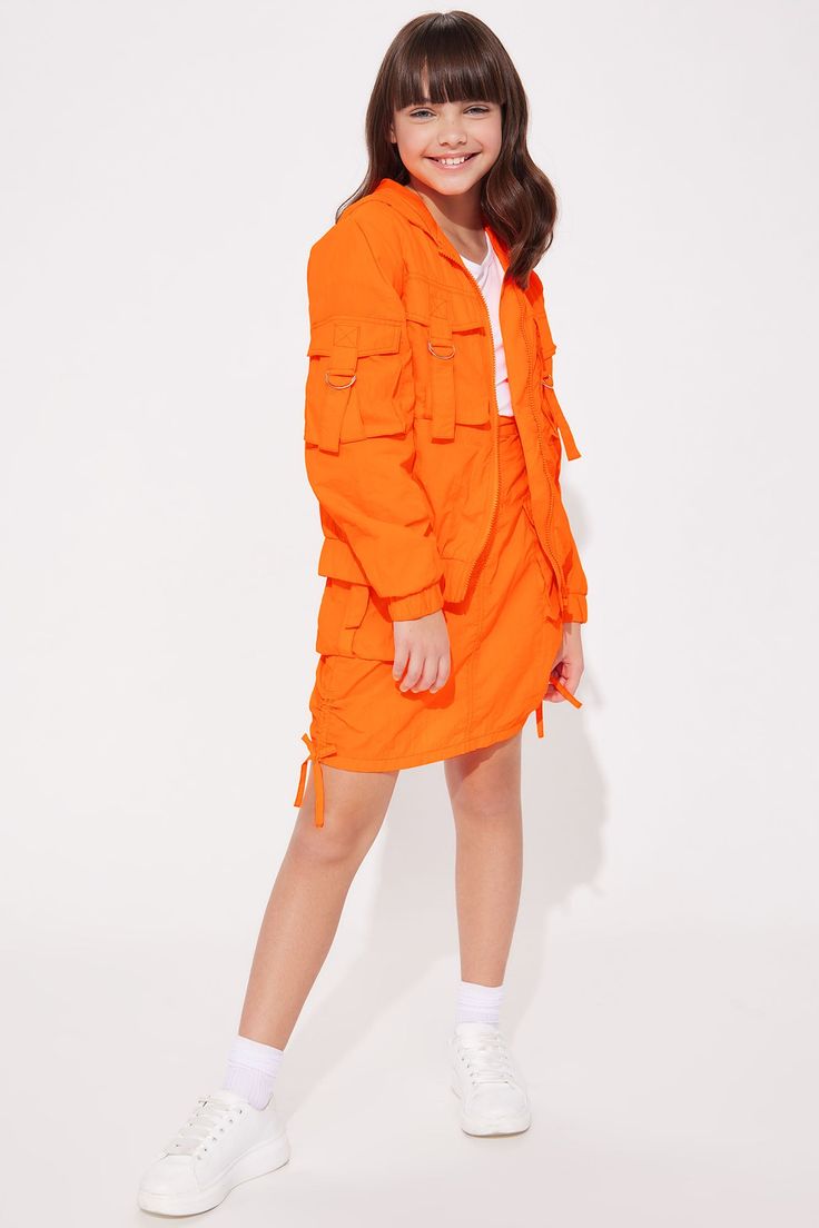 Available In Orange And Neon Pink. Cargo Jacket Solid Pockets Zipper Closure Hooded 100% Nylon Imported | Mini Nylon Cargo Jacket in Orange size 4 by Fashion Nova Solid Nylon Raincoat With Pockets, Solid Color Spring Parka For Streetwear, Fall Nylon Outerwear With Cargo Pockets, Spring Streetwear Solid Color Parka, Spring Outerwear With Cargo Pockets For Outdoor Activities, Spring Streetwear Solid Parka, Casual Spring Windbreaker With Multiple Pockets, Spring Outerwear With Side Pockets For Outdoor Activities, Spring Windbreaker With Side Pockets And Long Sleeves