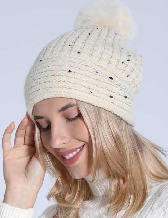 Sequin Faux Fur Pom Pom Beanie Hat, a stylish and cozy accessory to keep you warm and chic during the colder months. Crafted with care, this beanie hat features a soft faux fur pom pom embellished with sparkling sequins, adding a touch of glamour to your winter wardrobe. The classic beanie design offers both warmth and comfort, while the sequin detailing adds a hint of sparkle and sophistication to your look. DIMENSION & CONTENTContents : Soft knit textureStretches to fit all sizes Beanie Design, Fur Pom Pom Beanie, Pom Pom Beanie Hat, Cozy Accessories, Hat Types, Sunglass Chain, Faux Leather Belts, Faux Fur Pom Pom, Pom Beanie