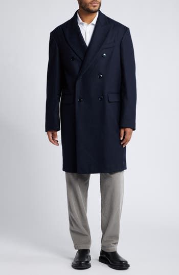 Cut from a rich Marine Melton wool blend, this minimalist coat is punctuated by precise peaked lapels and a trio of pockets for classic appeal. 39" length (size 50 EU) Double-breasted button closure Peaked lapels Chest welt pocket; front flap pockets Back vent Lined 52% wool, 48% acetate Dry clean Made in Italy Luxury Wool Outerwear For Business Casual, Wool Double-breasted Outerwear For Semi-formal Occasions, Tailored Wool Coat With Concealed Placket For Semi-formal Occasions, Timeless Formal Wool Coat For Fall, Formal Pea Coat With Notch Lapel And Concealed Placket, Timeless Wool Coat With Concealed Placket, Classic Long Wool Coat For Business Casual, Elegant Winter Sport Coat With Concealed Placket, Office Wool Coat With Notch Lapel And Double Button