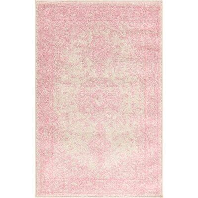 a pink and white rug on a white background