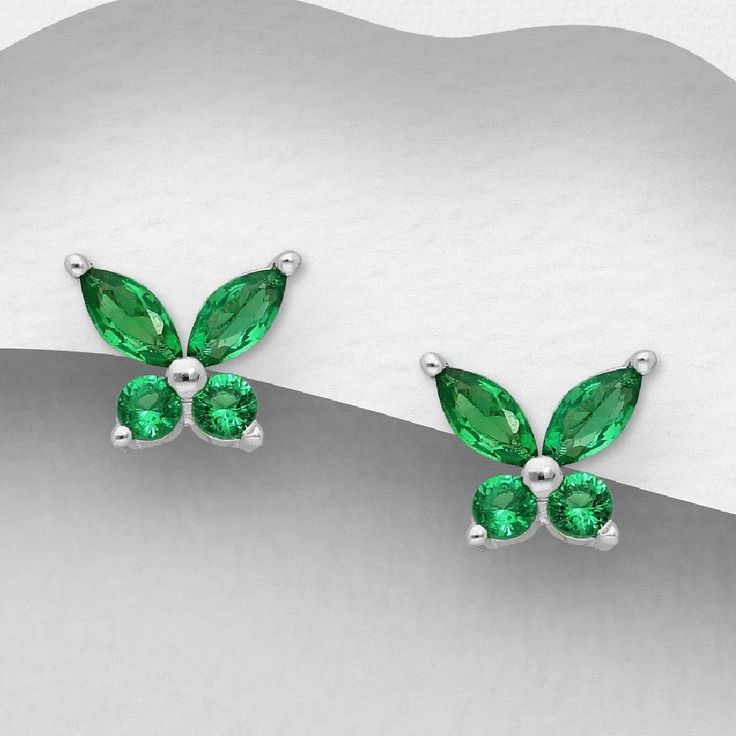 Add sparkle to every moment with 925 Sterling Silver Butterfly Earrings featuring stunning blue or green CZ simulated diamonds. Just arrived, popular picks! Width: 9/32 inches Height: 1/4 inches Sparkle Butterfly, Silver Butterfly Earrings, Silver Butterfly, Blue Decor, Butterfly Earrings, Forest Green, Sparkle, Diamonds, 925 Sterling Silver