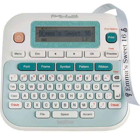 a blue and white calculator sitting on top of a white table next to a ribbon