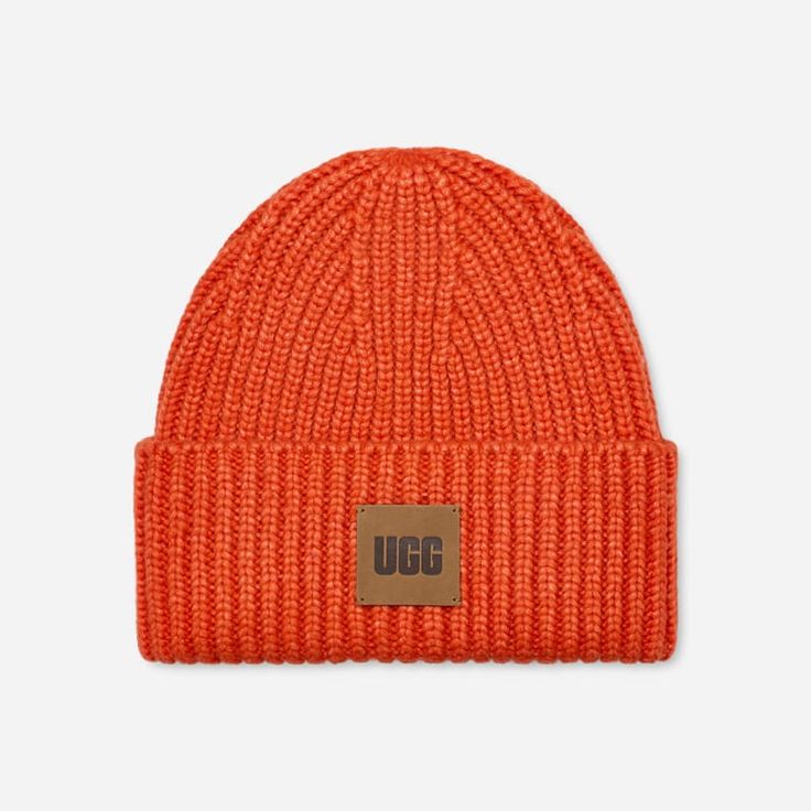 Made from a cozy blend, this best-selling beanie features a chunky rib-knit fabric and leather logo patch. Available in a variety of bold and classic colors. | Rib knit beanie. Self - 78% Acrylic/17% Nylon/5% RSW Wool. Lining - Unlined. Leather label with Graphic UGG® Font. Imported. | UGG® Chunky Rib Beanie Acrylic Blend Hats in Orange Soda Casual Solid Color Hats With Logo Patch, Classic Beanie For Fall Streetwear, Classic Fall Beanie For Streetwear, Casual Fall Beanie With Logo Patch, Fall Casual Beanie With Logo Patch, Casual Beanie With Logo Patch, Trendy Outdoor Hats With Logo Patch, Chunky Knit Hat For Outdoor Fall Activities, Fall Outdoor Chunky Knit Hat