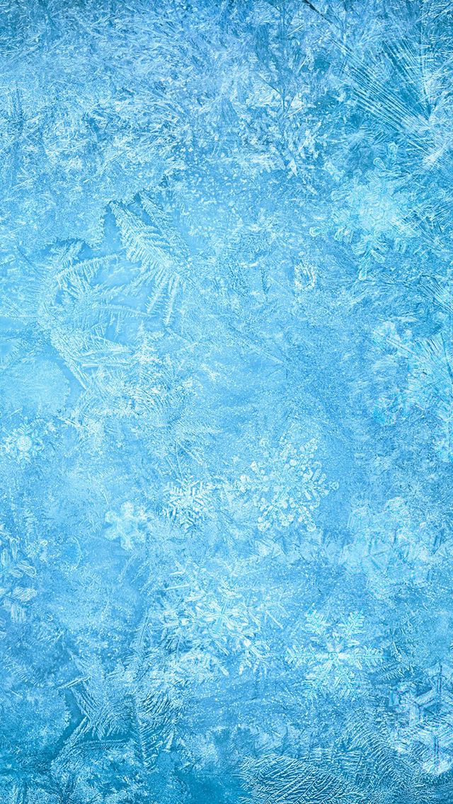 an image of a blue background that looks like it has snow flakes on it