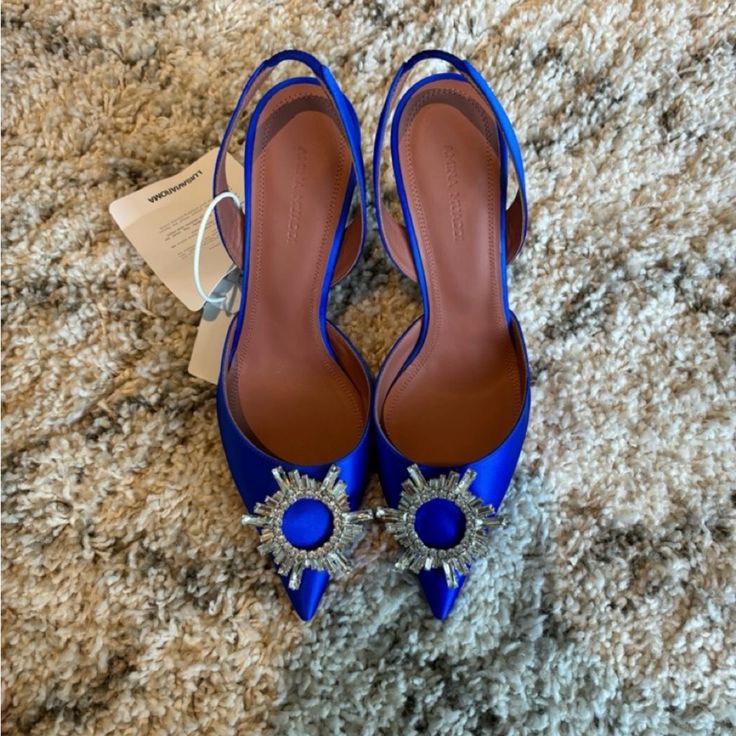 Amina Muaddi Begum Slingback Size 39. Never Been Worn!! Chic Blue Slingback Pumps For Party, Blue High Heel Slingback Pumps For Evening, Blue Slingback Heels For Party, Blue Open Heel Slingback Pumps For Evening, Designer Blue Slingback Pumps With Pointed Toe, Luxury Blue Pointed Toe Slingback Pumps, Blue Pointed Toe Slingback Pumps Luxury, Blue Ankle Strap Slingback Pumps For Party, Blue Pointed Toe Slingback Pumps For Party