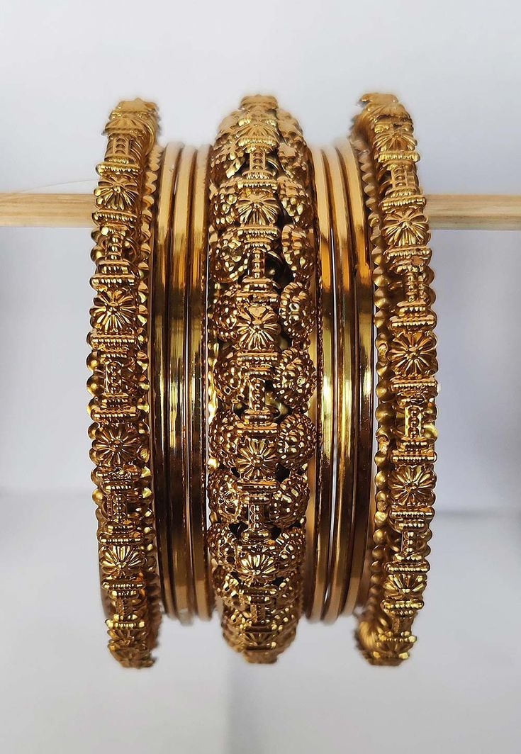 Alloy Based Metal Bangle Set in Golden This Bangle Set is Oxidised This Set consists of 9 Bangles Oxidised Bangles, Golden Bangles, Wedding Jewelry Sets Bridal Jewellery, Utsav Fashion, Bangles Style, Jewelry Indian, Gold Jewelry Indian, Stone Studs, Dark Yellow