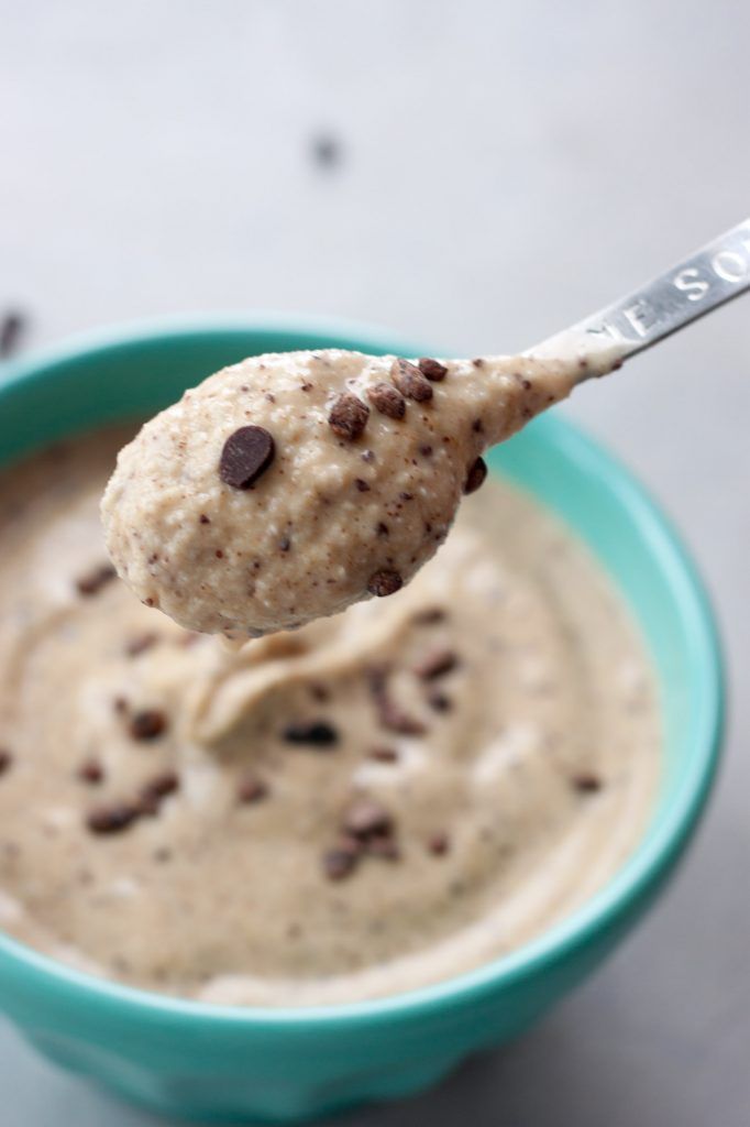 a spoon full of chocolate chip ice cream