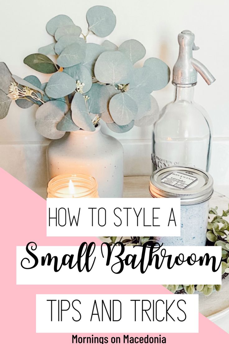 a vase filled with flowers next to a candle on top of a wooden table and the words how to style a small bathroom tips and tricks