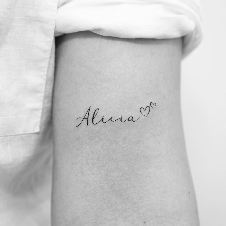 a woman's arm with the word alera written in cursive font