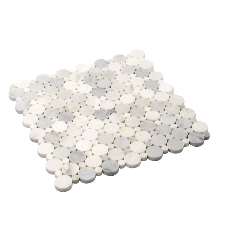 This marble mosaic tile is the interpretation of traditional penny rounds with a slightly different graphic appeal. The ever-classic pattern is recreated using two different size penny tiles in a crisp white palette for enhanced visual impact. It induces a feeling of relaxation and peace in the room with a circular pattern that is pleasing to the eye! This white marble penny tile is the perfect way to create a playful scheme while still maintaining a neutral palette for a serene feel! Create a v Penny Tile Floors, White Mosaic Tile, Wall Applications, Penny Round Mosaic, Minimalistic Aesthetic, White Marble Tiles, Penny Tile, Penny Round, White Mosaic