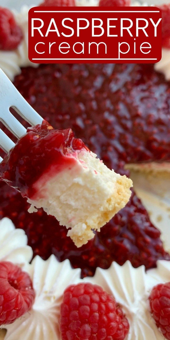 raspberry cream pie on a white plate with a fork in it and the cake is ready to be eaten