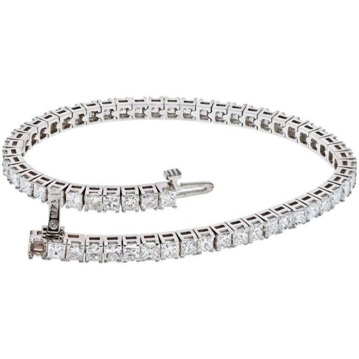 Indulge in the timeless elegance of our 14K White Gold 7 Carat Princess Cut One Line Tennis Bracelet. This exquisite piece is meticulously crafted in 14K white gold and adorned with a dazzling array of 7.70 carats of princess cut diamonds. Every diamond is carefully selected for its exceptional brilliance and fire, creating a captivating sparkle that will mesmerize onlookers.Designed to be worn effortlessly from day to night, this tennis bracelet is 7 inches long, draping gracefully around your Princess Cut Gold, Diamond Birthstone, Tennis Necklace, Shop Products, Diamond Design, Princess Cut Diamonds, Brilliant Diamond, Metal Bracelets, Tennis Bracelet